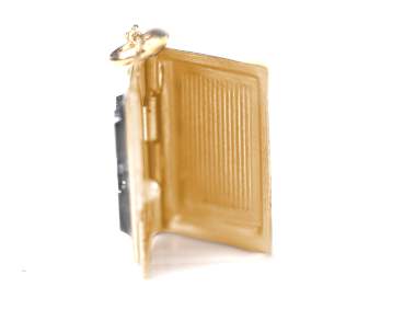 Tiny gold locket necklace. Dainty rectangular locket with rare black glass hematite