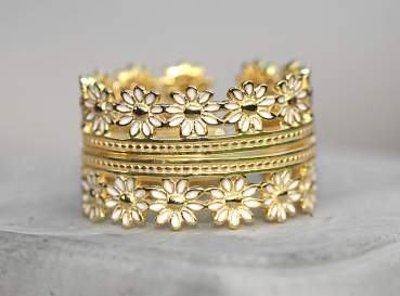 2 Daisy rings. Multiple wearing combinations. Gold plated sterling and white enamel