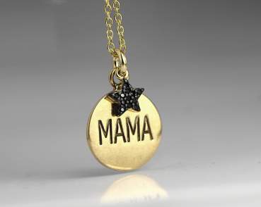 Golden engraved mama pendant with black cubic zirconia star.