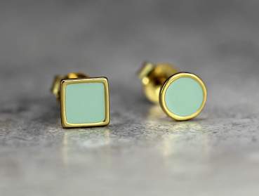 Mismatched stud earrings. 18k gold over sterling and enamel.