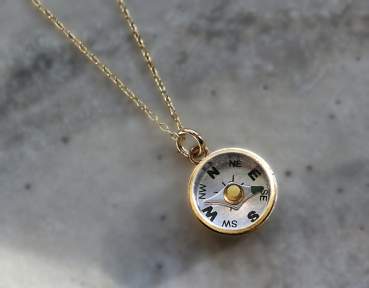 Dainty gold working compass necklace. 18k gold vermeil plated sterling silver