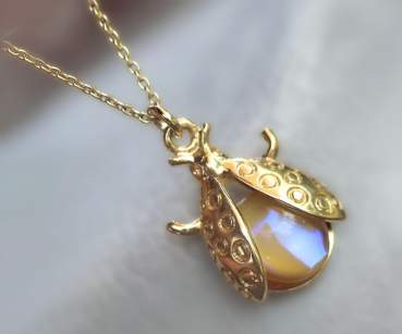Lightning Bug necklace with vintage glass opal. Vermeil gold plated sterling