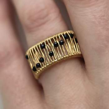 Wired ring with MOVING black beads. 18k gold over silver