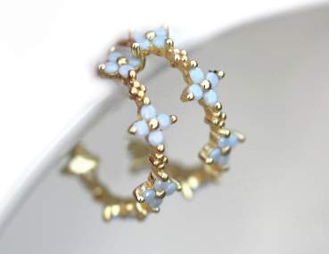 Light blue cz flowers small gold hoop earrings. Dainty gold vermeil floral studs. 18k gold over sterling