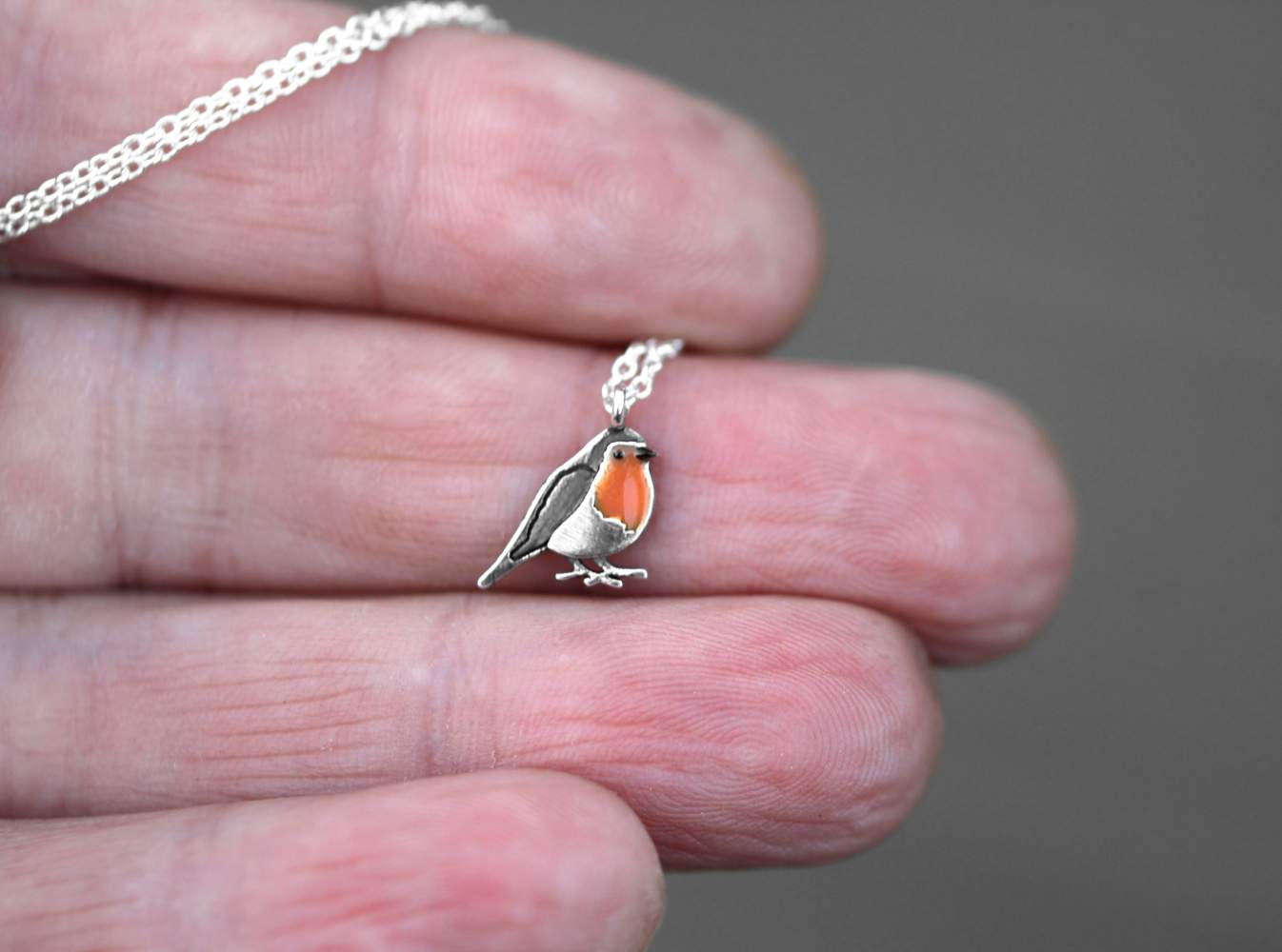 Dainty Robin Bird necklace. Sterling Silver and orange enamel