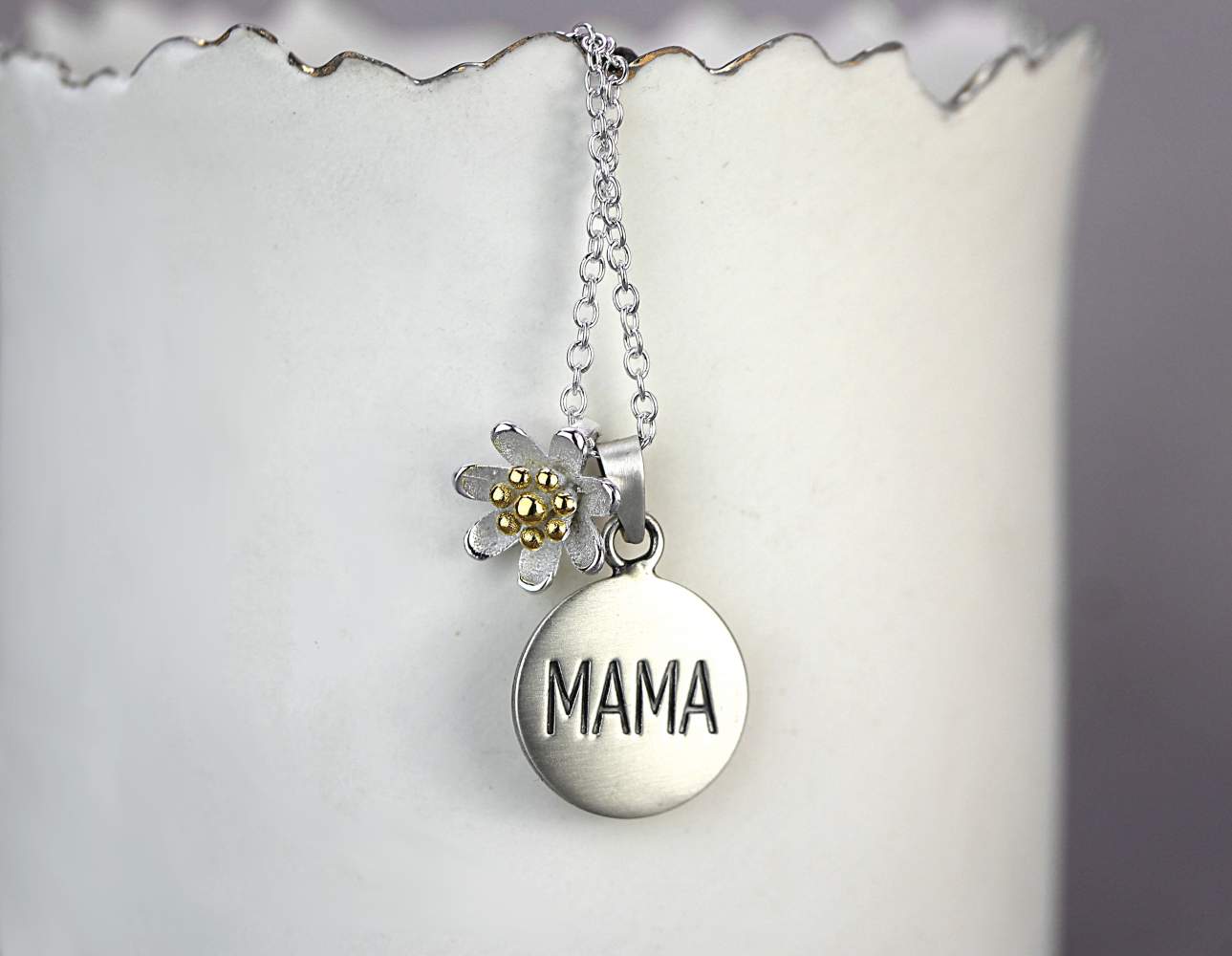 Silver necklace with engraved MAMA pendant and little flower