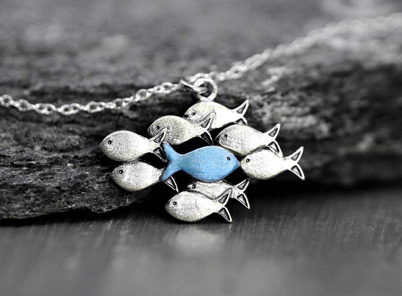 Silver necklace AGAINST THE CURRENT with blue fish