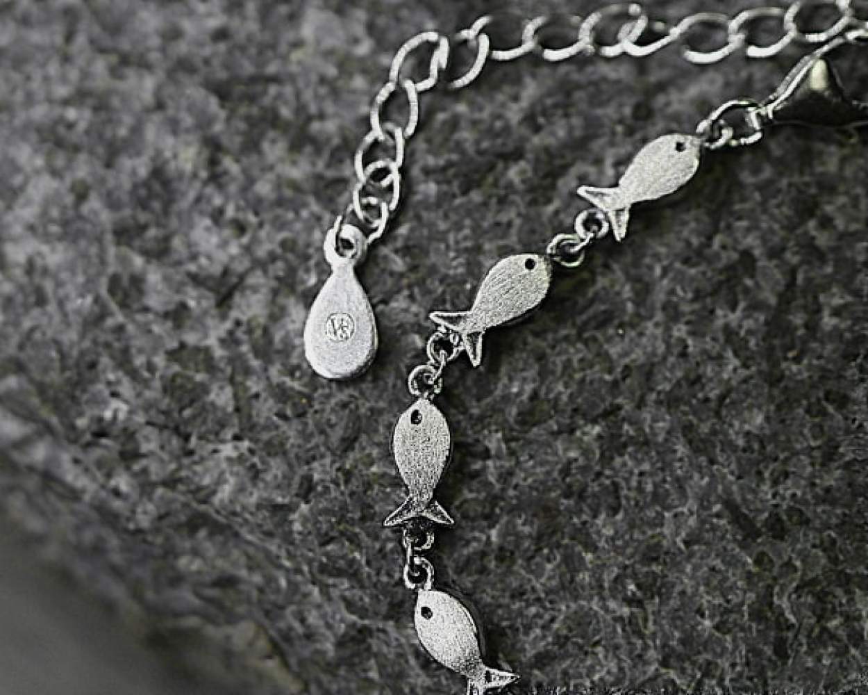 Swimming against the current silver bracelet